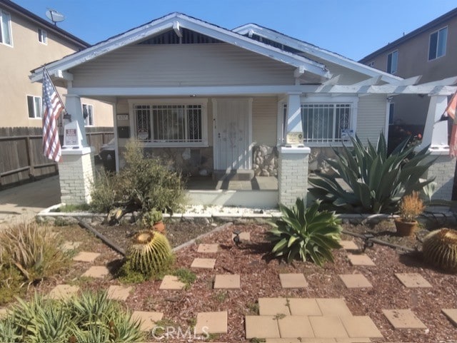 view of front of property featuring covered porch