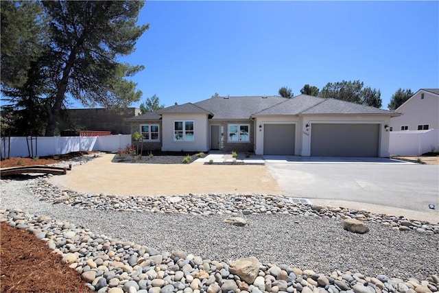 single story home featuring a garage