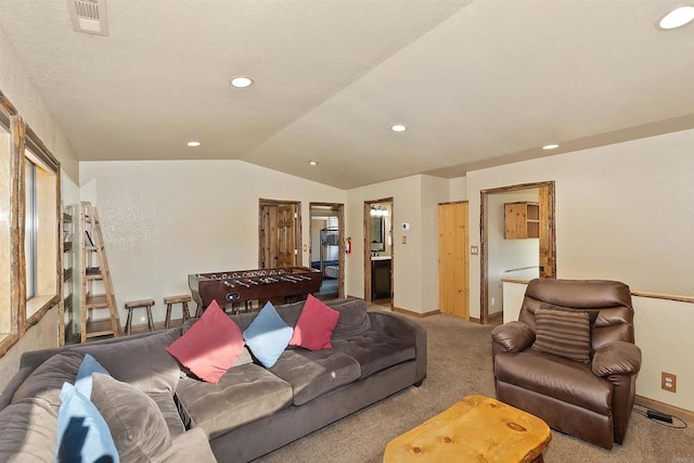 living room with carpet flooring and vaulted ceiling