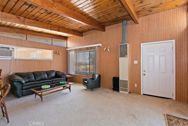 carpeted living room with a wall unit AC, wooden ceiling, wooden walls, and beamed ceiling