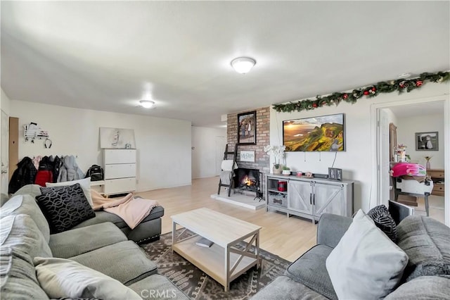 living room featuring a fireplace and hardwood / wood-style floors