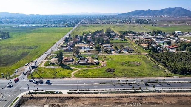 drone / aerial view featuring a mountain view