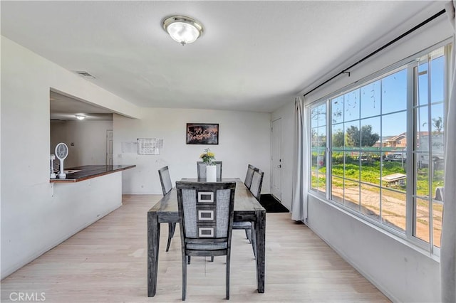 dining room featuring light wood-type flooring