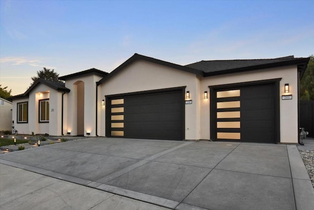 view of front of property featuring a garage