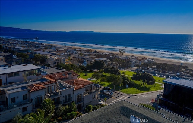 aerial view with a view of the beach and a water view