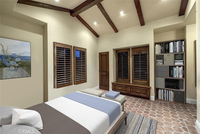 bedroom featuring beamed ceiling and high vaulted ceiling