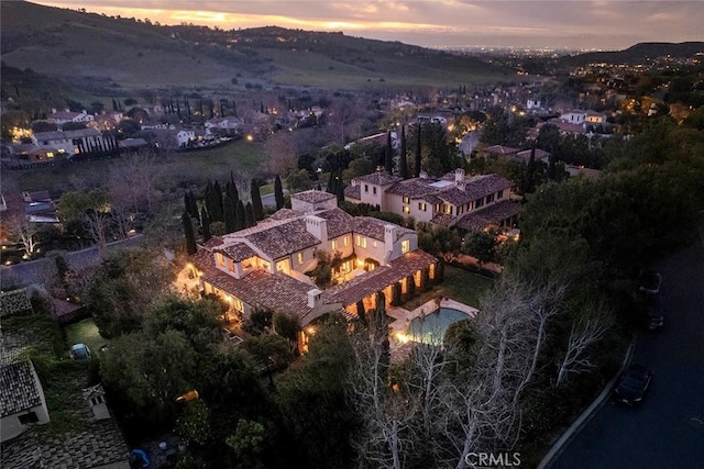 view of aerial view at dusk