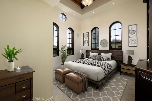 bedroom with a high ceiling