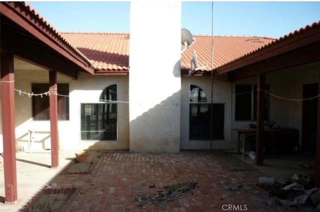 view of home's exterior featuring a patio area