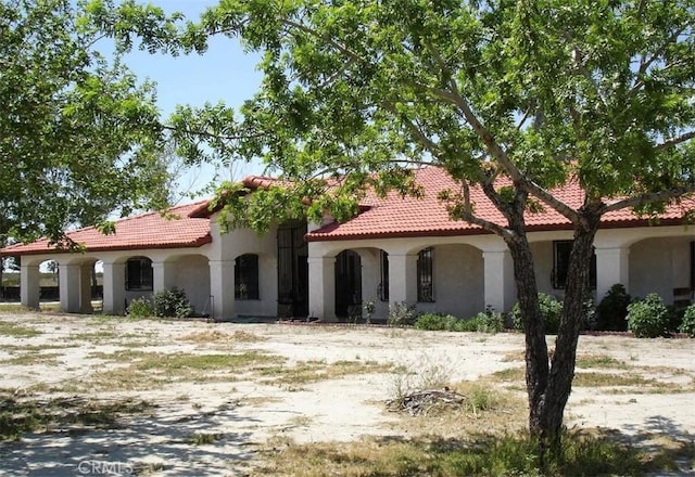 view of mediterranean / spanish-style house