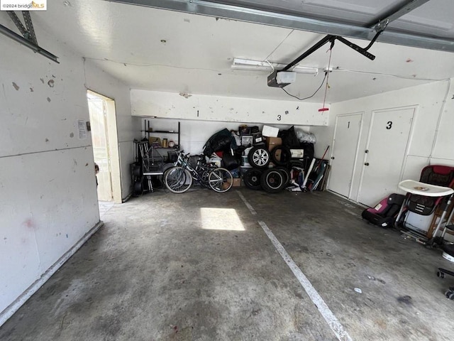 garage featuring a garage door opener