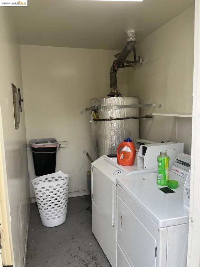 laundry area featuring washing machine and clothes dryer