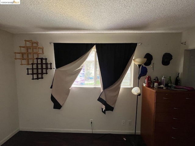 bedroom with a textured ceiling