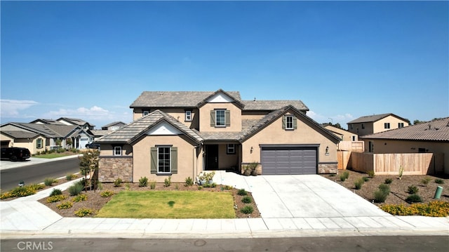 view of front facade with a front lawn and a garage