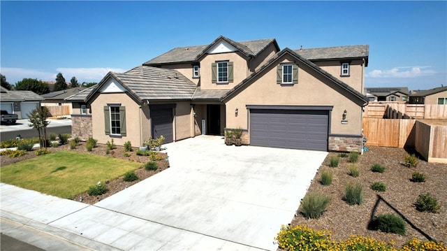 view of front of property featuring a garage