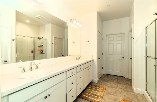 bathroom featuring vanity and walk in shower