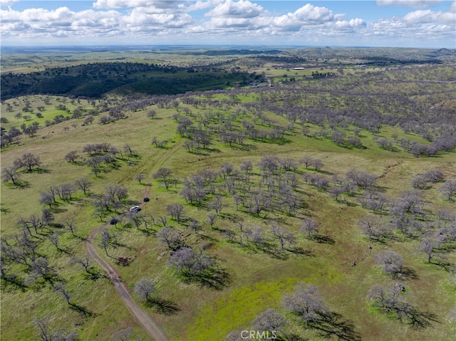 birds eye view of property featuring a rural view