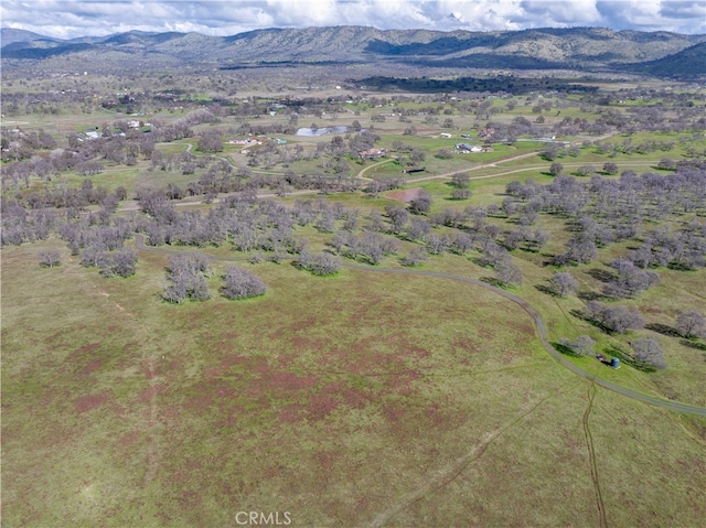 aerial view featuring a rural view and a mountain view