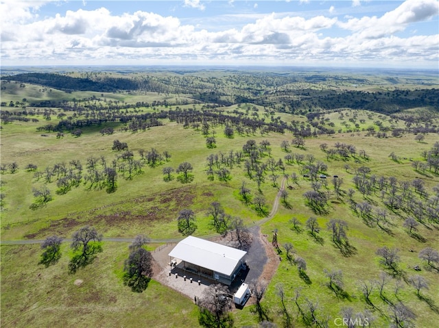 birds eye view of property featuring a rural view