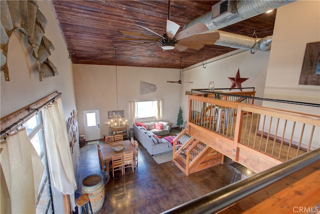 living room with high vaulted ceiling, wooden ceiling, and ceiling fan with notable chandelier