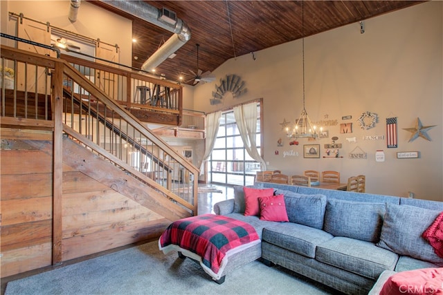 living room with carpet flooring, high vaulted ceiling, wooden ceiling, and ceiling fan with notable chandelier