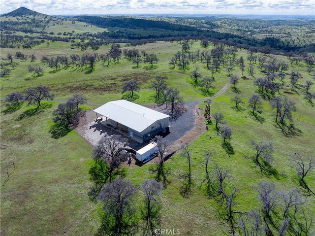 bird's eye view with a mountain view and a rural view