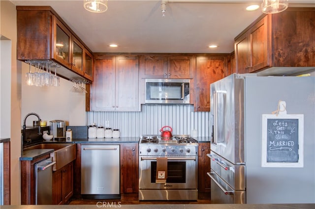 kitchen featuring appliances with stainless steel finishes and sink