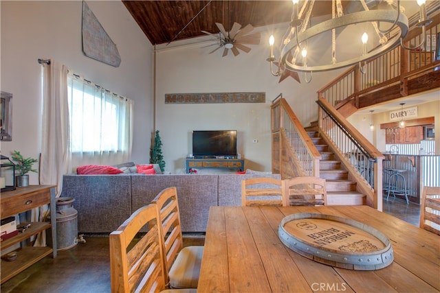 dining space featuring an inviting chandelier, high vaulted ceiling, and wooden ceiling