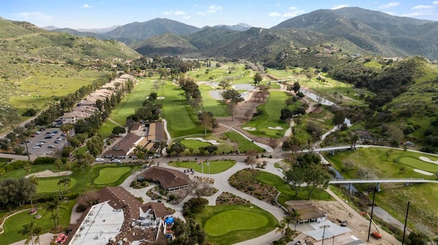 birds eye view of property featuring a mountain view