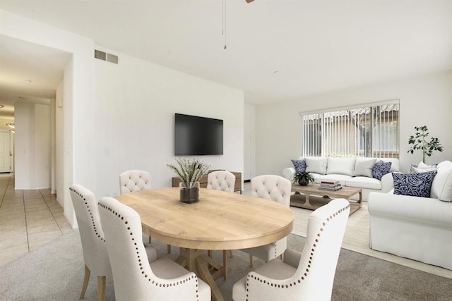 dining room featuring light tile patterned floors