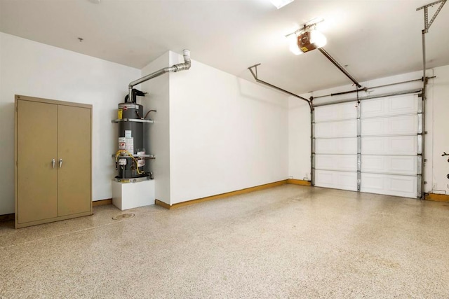 garage with secured water heater and a garage door opener