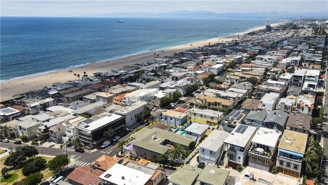 aerial view featuring a water view and a view of the beach