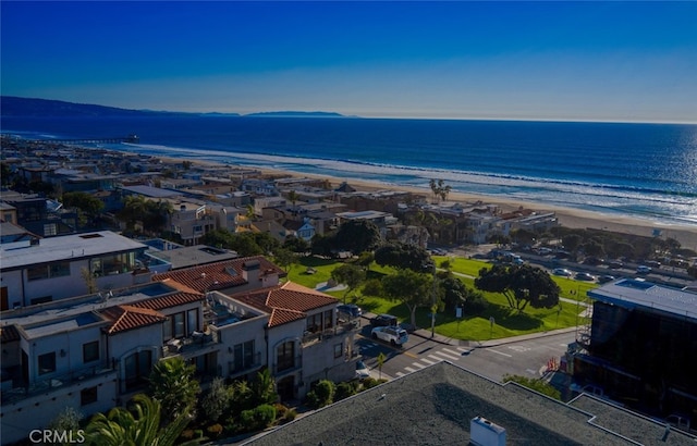 aerial view featuring a view of the beach and a water view