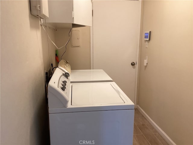 laundry area with washing machine and dryer