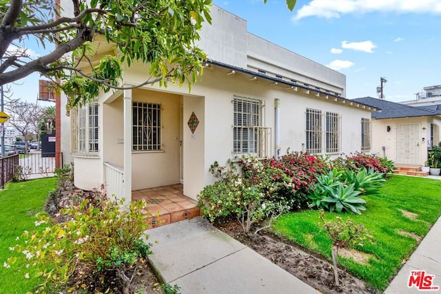 exterior space with a lawn