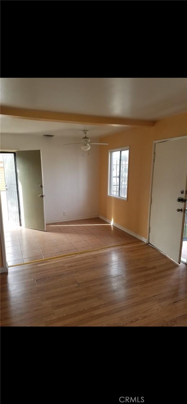 entryway featuring light hardwood / wood-style flooring and ceiling fan