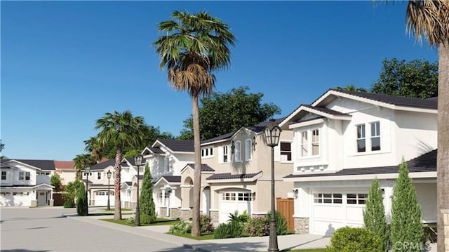 view of front of property with a garage