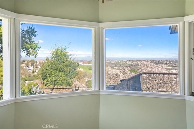 unfurnished sunroom featuring plenty of natural light