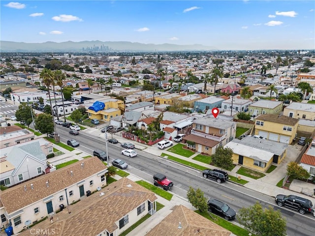6820 S Van Ness Ave, Los Angeles, CA 90047 - aerial perspective of suburban area with a mountainous background