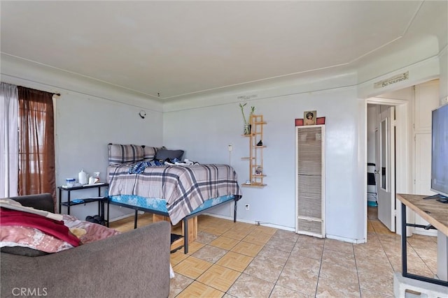 6820 S Van Ness Ave, Los Angeles, CA 90047 - bedroom with a heating unit and baseboards