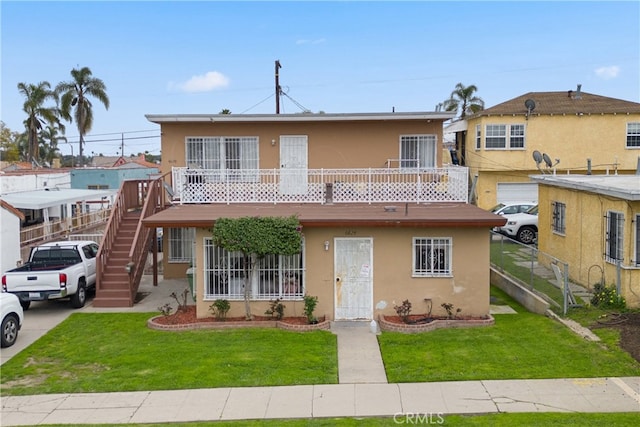 view of front of house with a front lawn