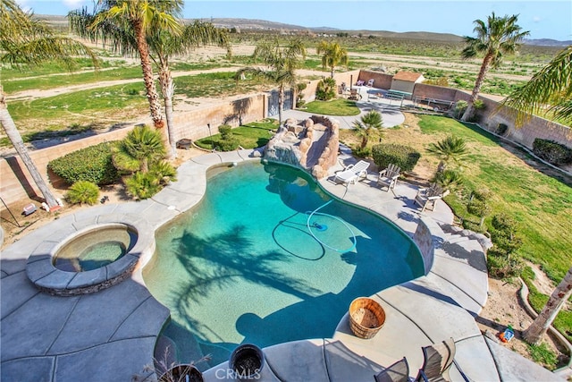 view of pool with a patio and an in ground hot tub