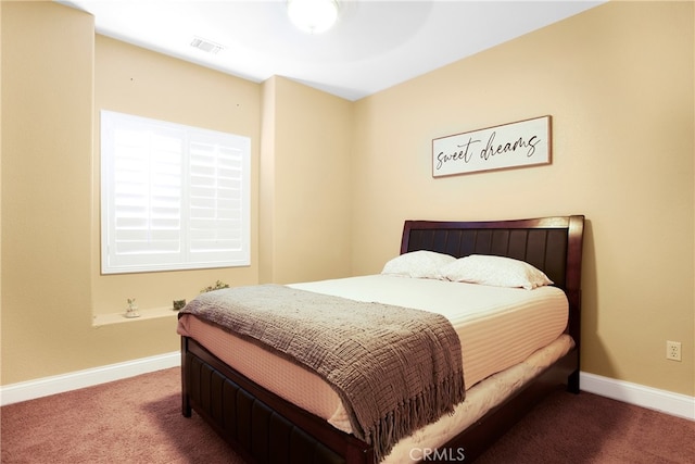 bedroom featuring carpet