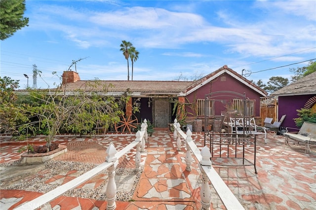 view of front of house with a patio