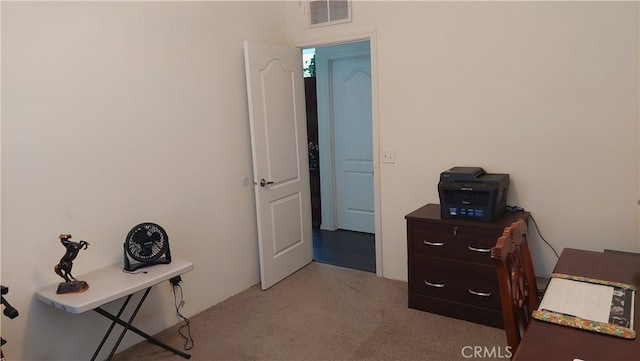 home office with light colored carpet