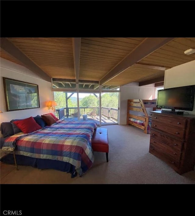 bedroom featuring vaulted ceiling with beams, carpet floors, and access to outside