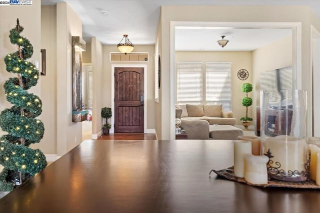 foyer entrance with hardwood / wood-style flooring