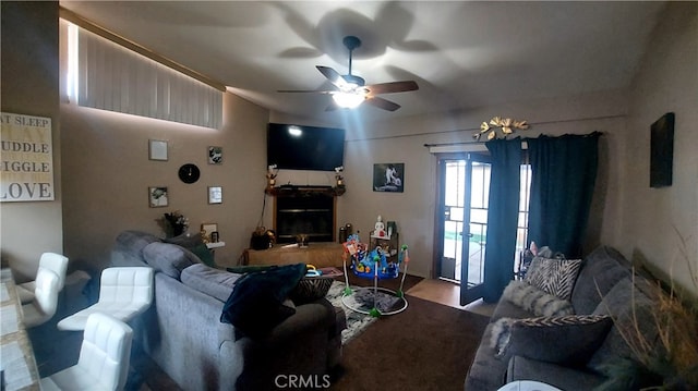 living room with french doors, hardwood / wood-style flooring, and ceiling fan