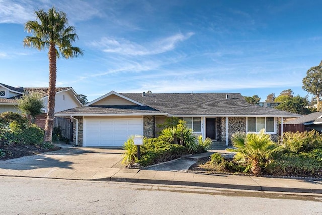 ranch-style house featuring a garage