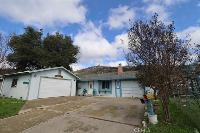 ranch-style home with a garage